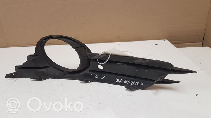 Opel Corsa D Front fog light trim/grill 13211479