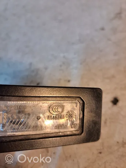 Audi A6 S6 C6 4F Lampa oświetlenia tylnej tablicy rejestracyjnej A046341