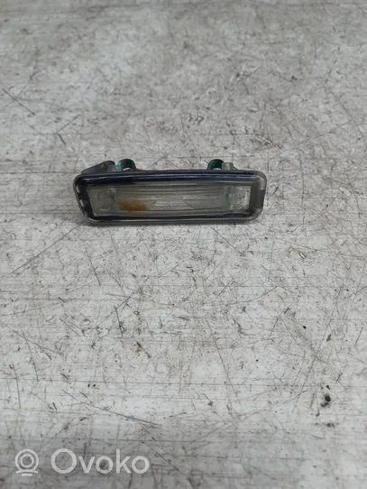 Ford Focus Lampa oświetlenia tylnej tablicy rejestracyjnej 413550