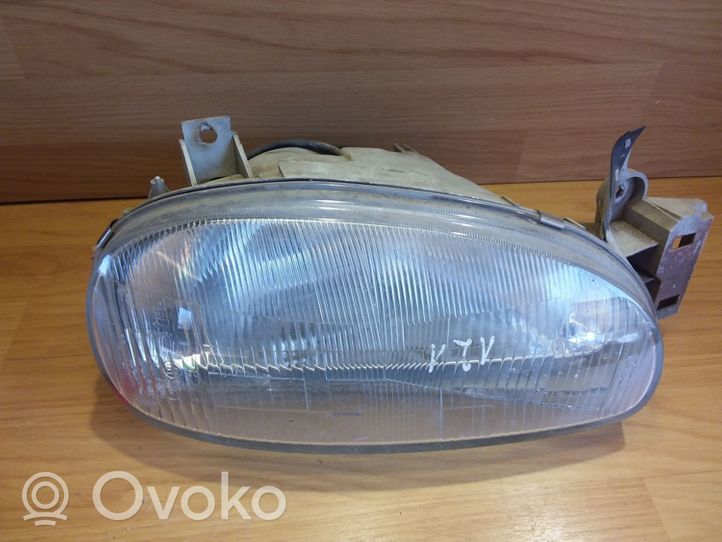 Mazda 121 Lampa przednia 0290061