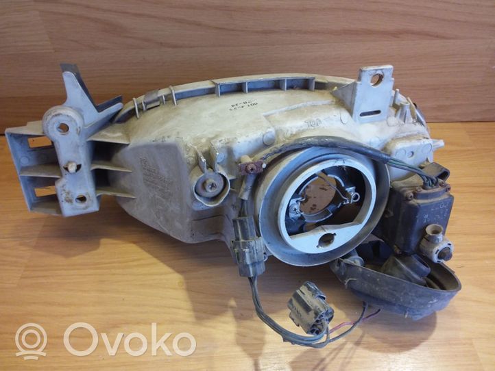 Mazda 121 Lampa przednia 0290061