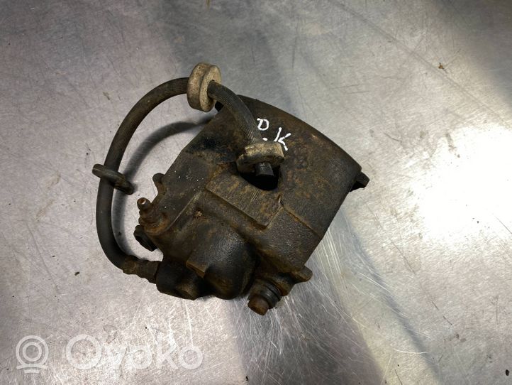 Volkswagen Golf II Front brake caliper 