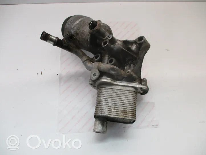 Opel Astra J Supporto di montaggio del filtro dell’olio 55566784