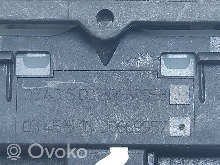 Volvo V50 Przycisk centralnego zamka 0565832