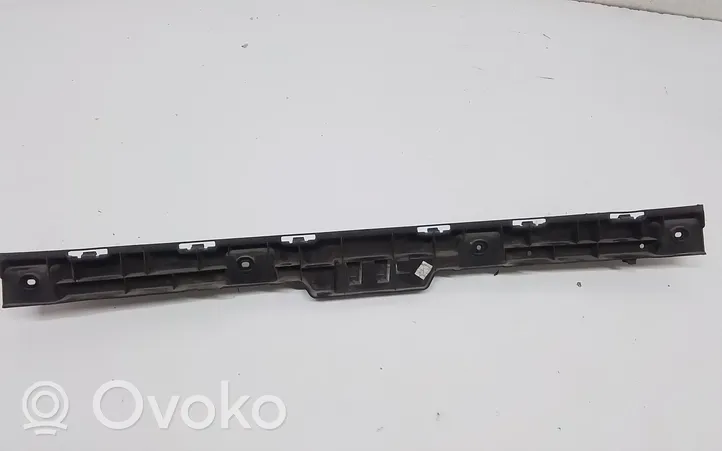 Volkswagen PASSAT B7 USA Uchwyt / Mocowanie zderzaka tylnego 561807863A