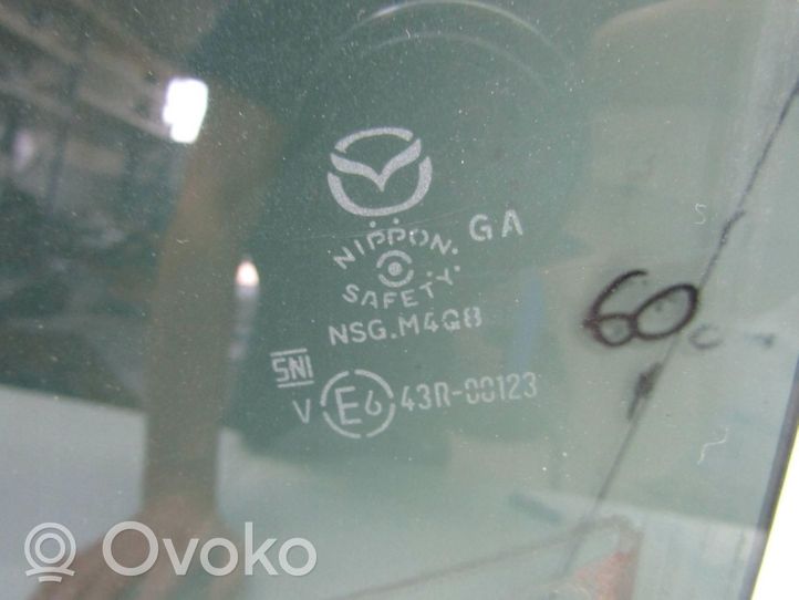 Mazda 3 aizmugurējo durvju stikls 