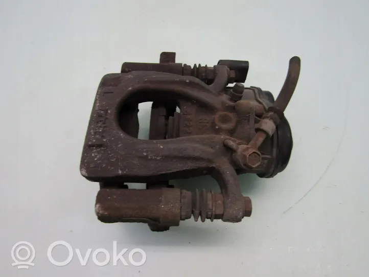 Nissan X-Trail T32 Caliper del freno trasero 440104CA0A