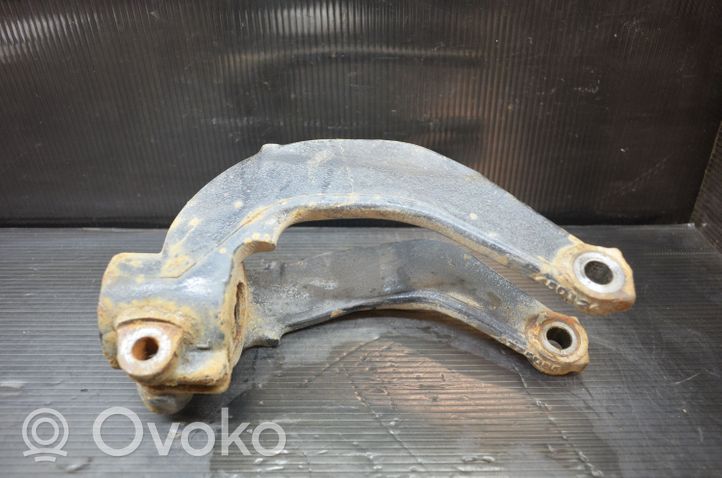 BMW X5 E70 Mocowanie / Wspornik dolny amortyzatora osi przedniej 6775085