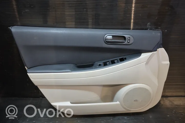 Mazda CX-7 Garniture de panneau carte de porte avant 