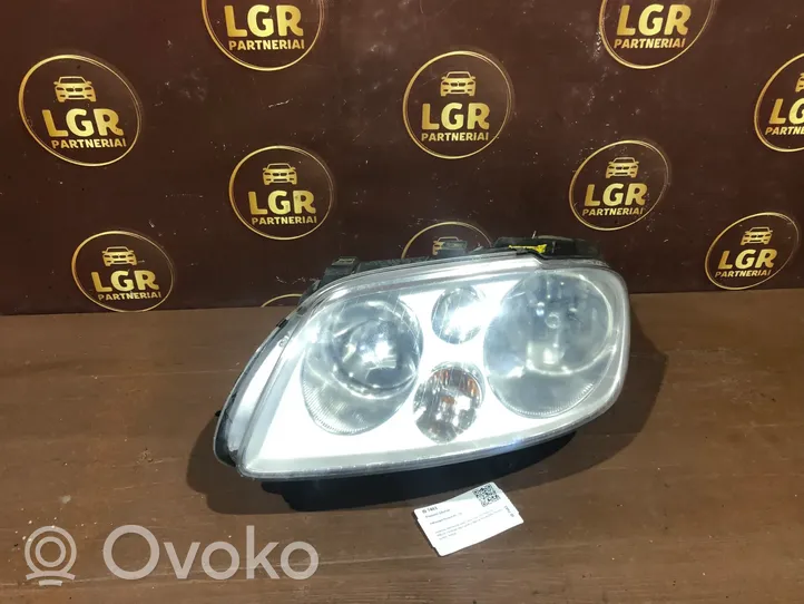 Volkswagen Touran I Lampa przednia 031205201