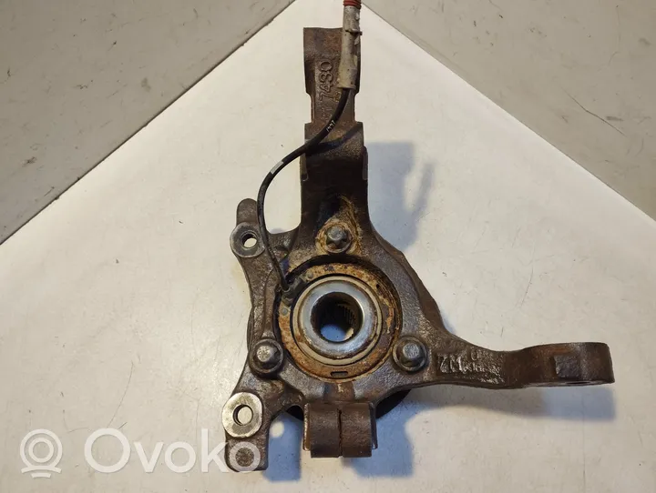 Opel Astra H Zwrotnica koła przedniego 1617430