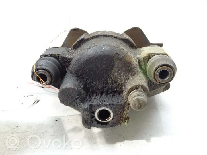 Chrysler LeBaron Front brake caliper 