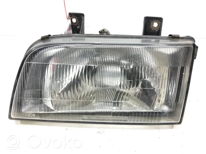 KIA Sportage Lampa przednia 0K01L-51020