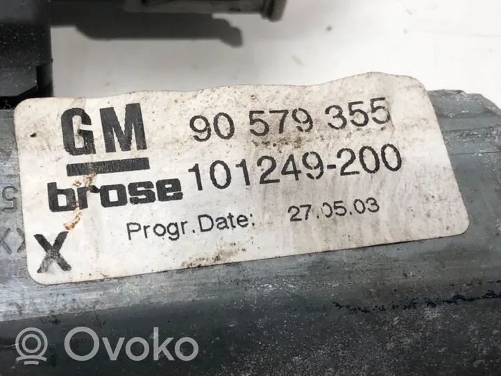 Opel Zafira A Elektryczny podnośnik szyby drzwi przednich 90579355