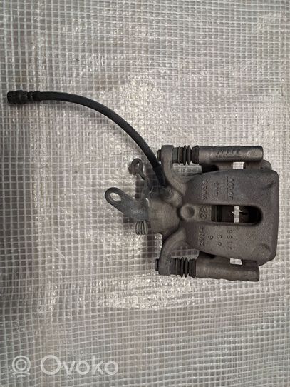 Volkswagen Golf VII Rear brake caliper 5QM615423A