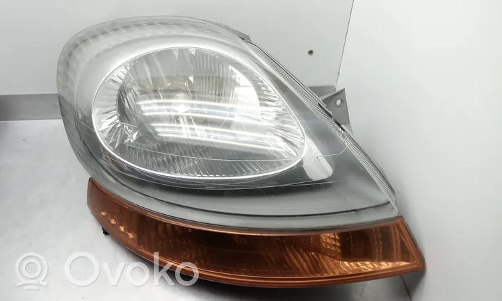 Opel Vivaro Headlight/headlamp 7700311372
