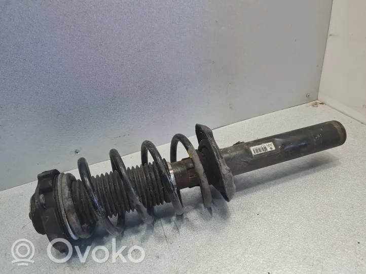 Volkswagen Tiguan Front shock absorber/damper 1T0412103A