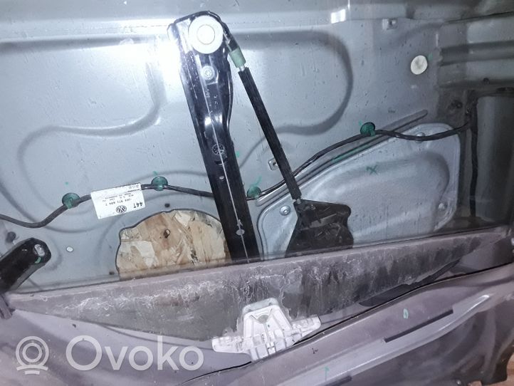 Volkswagen Golf V Elektryczny podnośnik szyby drzwi tylnych 1K0959704C