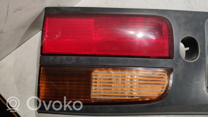 Renault Laguna I Listwa oświetlenie tylnej tablicy rejestracyjnej 7700420119