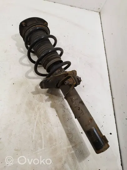 Volkswagen Golf VII Front shock absorber with coil spring 5Q0412014FQ