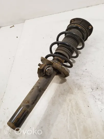 Volkswagen Golf VII Front shock absorber with coil spring 5Q0412014FQ