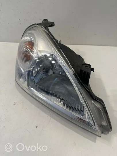 Suzuki Liana Lampa przednia 10032662