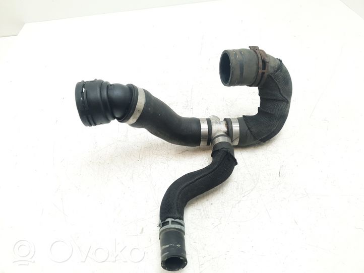 Audi RS6 C6 Engine coolant pipe/hose 4F0121087