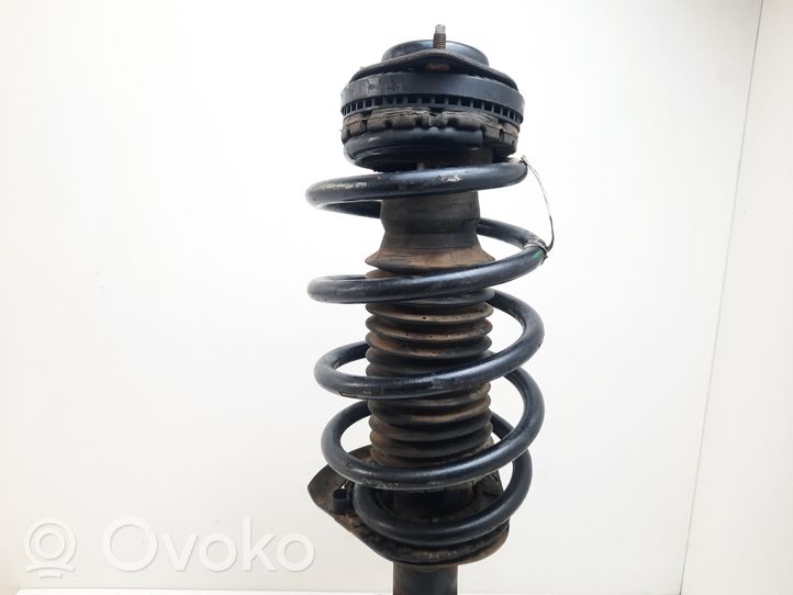 Chrysler Voyager Front shock absorber with coil spring 04743988AC