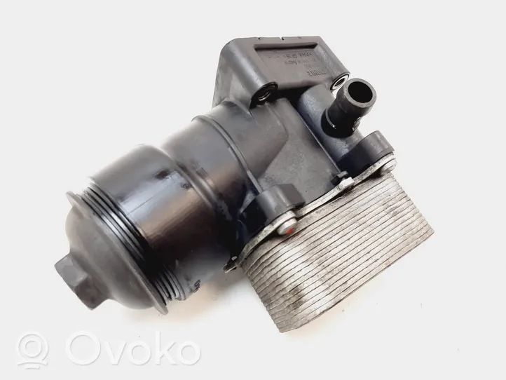 Volkswagen Golf VI Supporto di montaggio del filtro dell’olio 03L115389