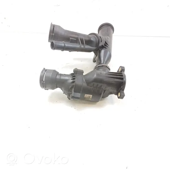 Volkswagen Caddy Termostat / Obudowa termostatu 04L121111Q