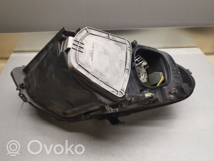 Chrysler Voyager Lampa przednia 04857711AB