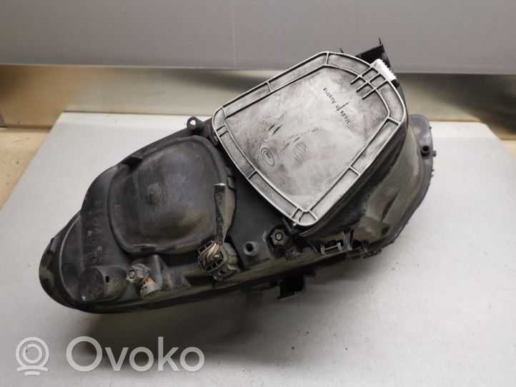 Chrysler Voyager Lampa przednia 04857710AB