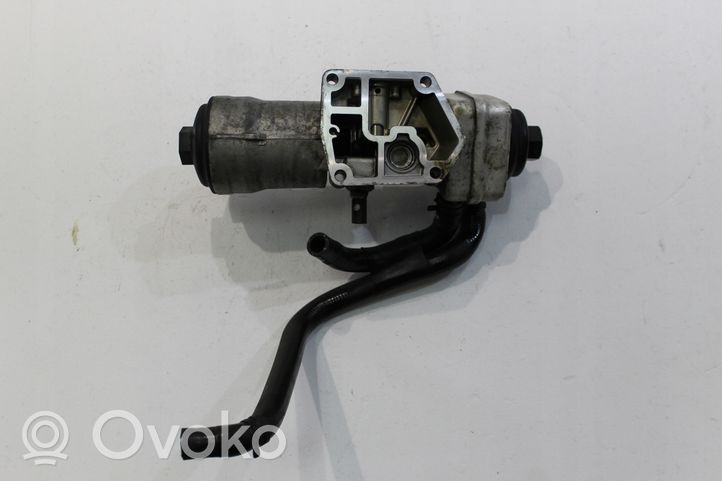 Volkswagen Fox Supporto di montaggio del filtro dell’olio 028117021K