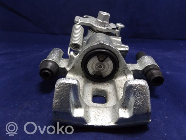 Nissan Sunny Caliper del freno trasero 0986473091