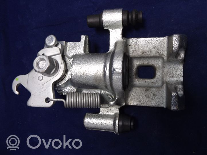 Nissan Sunny Caliper del freno trasero 0986473091