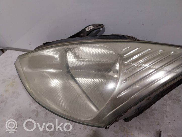 Ford Focus Lampa przednia XS4113006