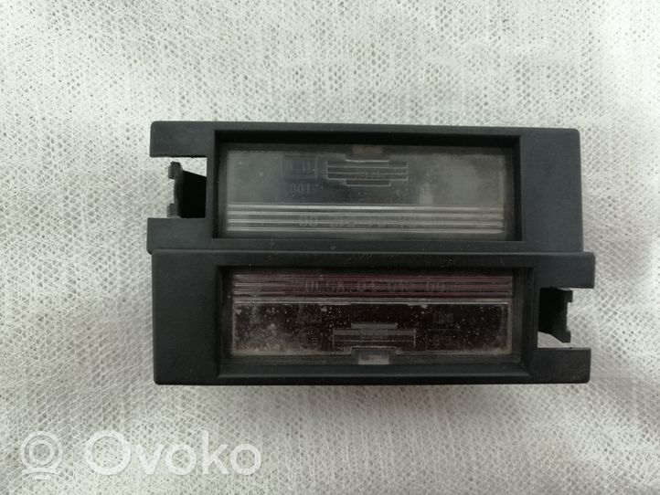 Opel Zafira B Lampa oświetlenia tylnej tablicy rejestracyjnej 0461200