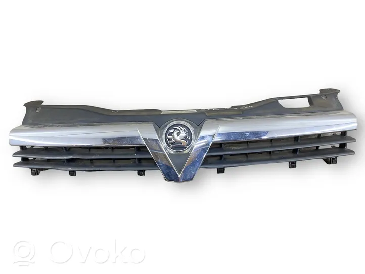 Opel Astra H Front bumper upper radiator grill 13108471