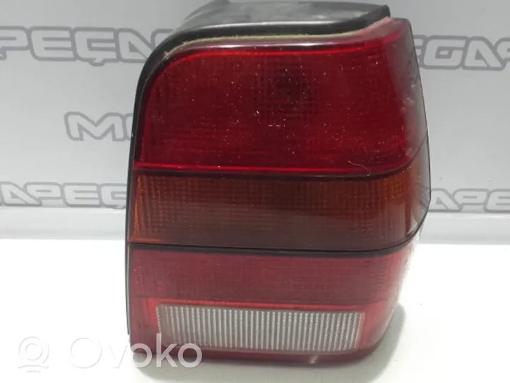 Volkswagen Polo II 86C 2F Lampy tylnej klapy bagażnika 