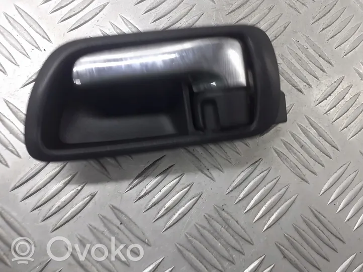 Toyota Corolla Verso E121 Klamka wewnętrzna drzwi przednich 69206-0F010