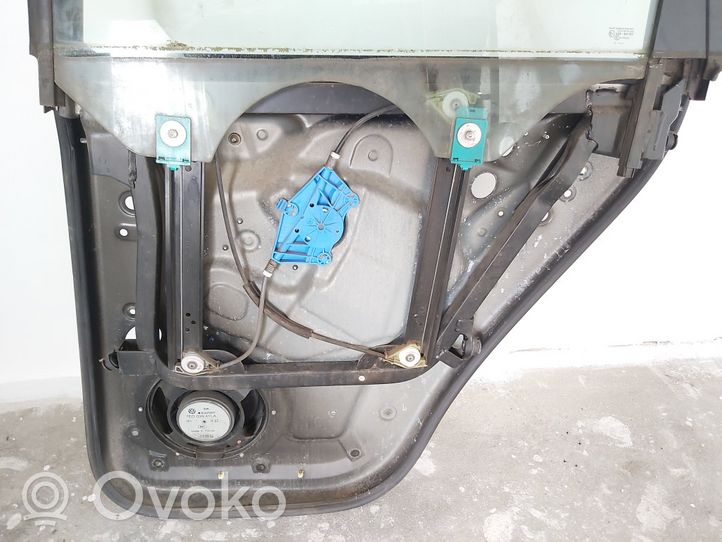 Volkswagen Touareg I Rear door window/glass frame 993464108