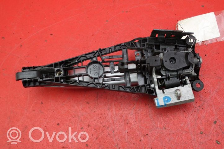 Opel Astra J Front door exterior handle 14096201