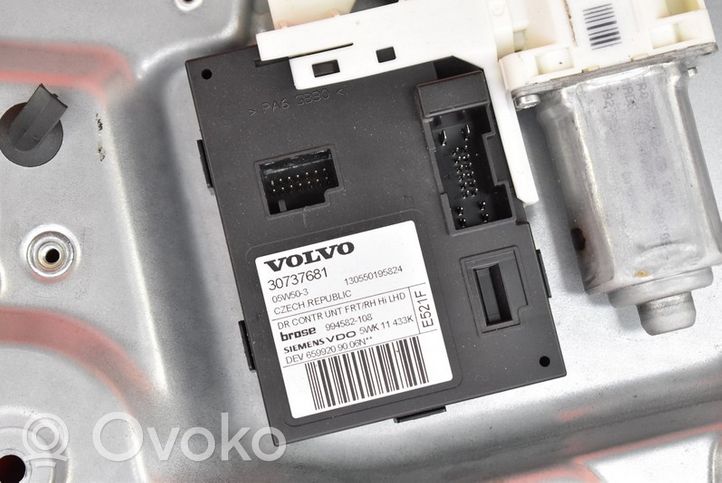 Volvo V50 Elektryczny podnośnik szyby drzwi przednich 8679081