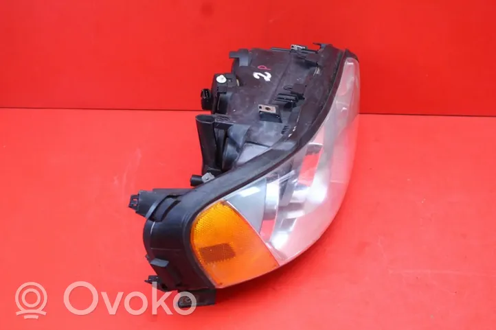 Volvo S60 Lampa przednia 89900266