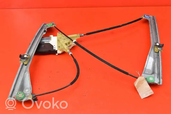 Renault Laguna III Elektryczny podnośnik szyby drzwi przednich 807310002R