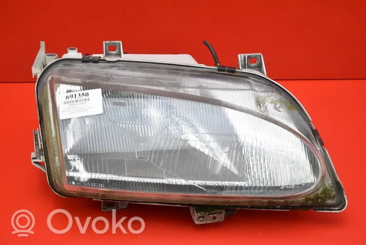 Ford Galaxy Lampa przednia 0301048312