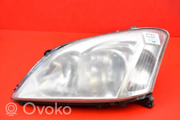 Toyota Corolla E120 E130 Lampa przednia 89006310