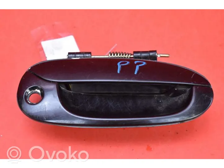 KIA Carens I Front door exterior handle K2N158410