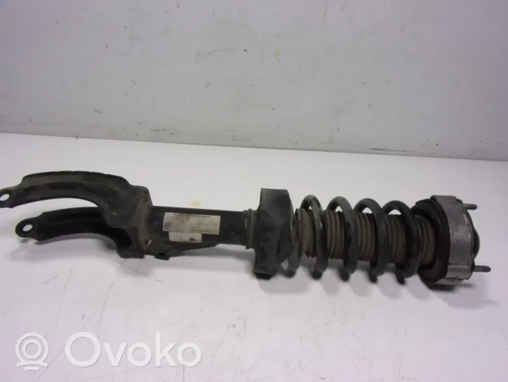 Volkswagen Touareg II Front shock absorber with coil spring 7P6413032AJ