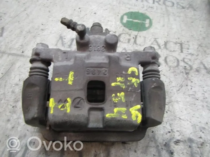 Subaru Impreza II Tylny zacisk hamulcowy 26692FE031